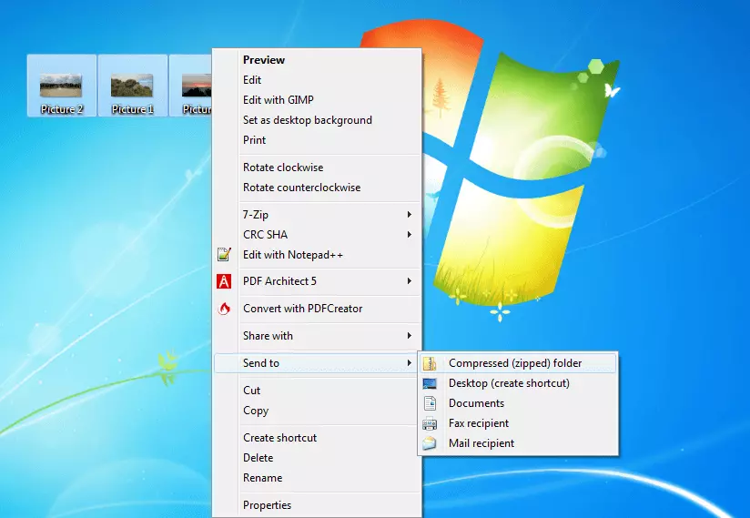 Screenshot of the Windows desktop where multiple files are sent to a ZIP-compressed folder via the context menu.